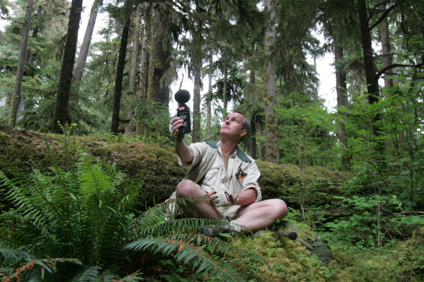 Gordon Hempton, a sound recordist, takes a noise level reading, Thursday, June 9, 2005, in Olympic National Park, after a three mile hike to his one square inch of quiet space. Hempton wants to declare one square inch of the Hoh valley a sanctuary of natural quiet as a way to defend the "soundscape" of Olympic National Park. (Photo by Ken Lambert / The Seattle Times)